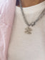 Collana con charm e catena in acciaio