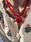 Collana con perline e cuore in resina