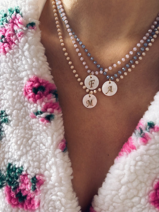 Collane rosario in acciaio con iniziale in madreperla