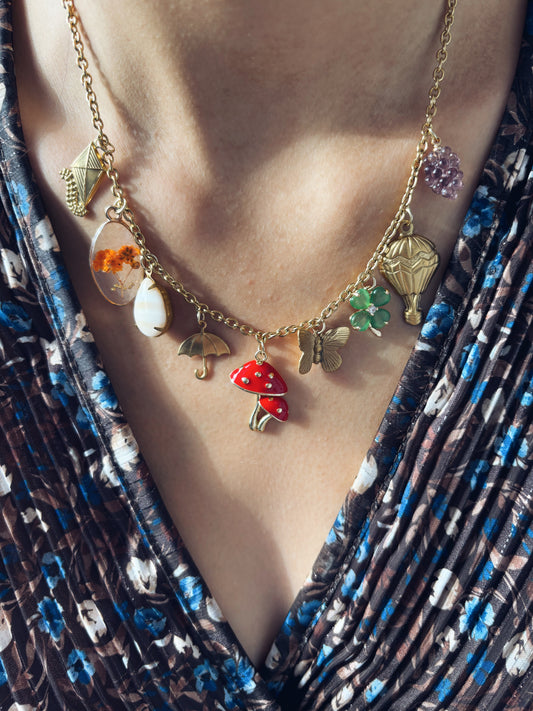 Collana multicharm in acciaio e ottone