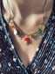 Collana multicharm in acciaio e ottone