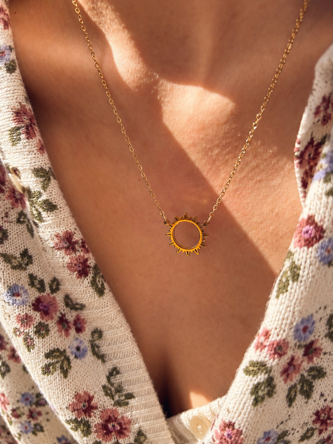 Collana in acciaio con sole