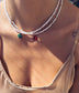Collana con perline in vetro e quadrifoglio smaltato