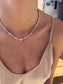 Collana con perline in vetro e cuore centrale in madreperla