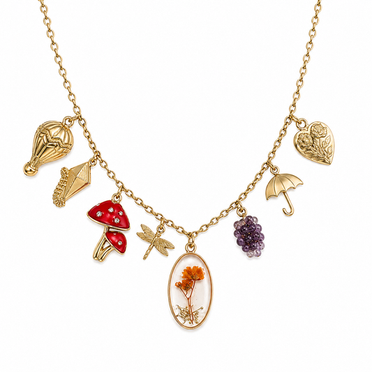 Collana multicharm in acciaio e ottone
