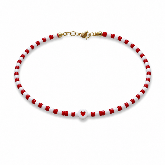 Bracciali con perline in vetro e cuore centrale
