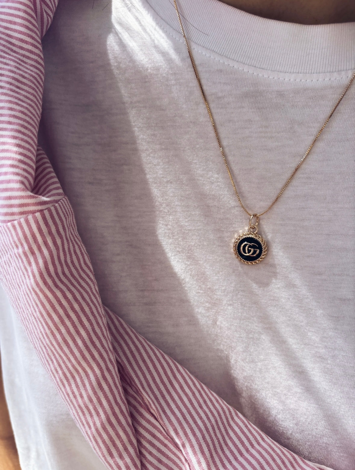 Collana con charm e catena in acciaio