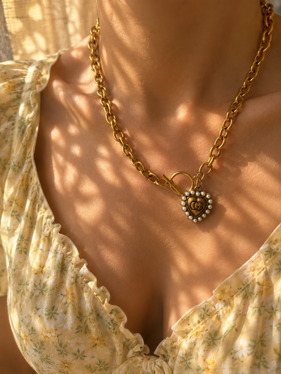 Collana con charm e catena in acciaio