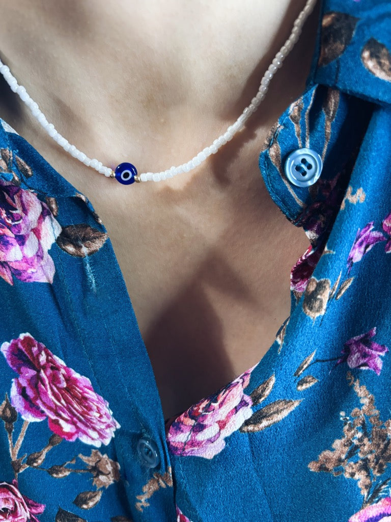 Collana con perline in vetro e occhio greco in resina