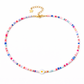 Collana con perline in vetro e margherita in madreperla