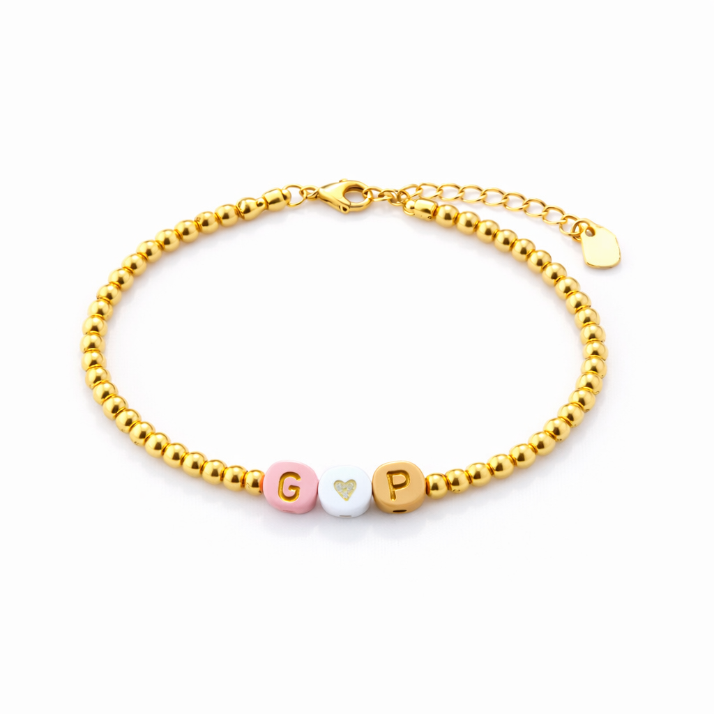 Bracciali con perline in acciaio e letterine da personalizzare