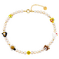 Collana con perle naturali e elementi in vetro