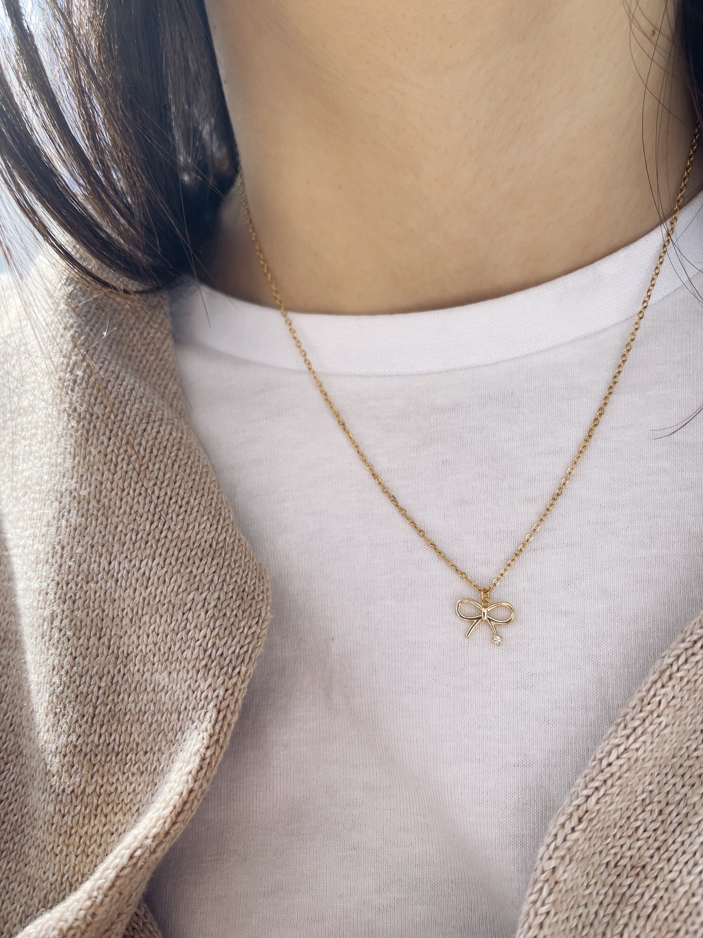 Collana in acciaio con fiocco - Dettagli di Moda