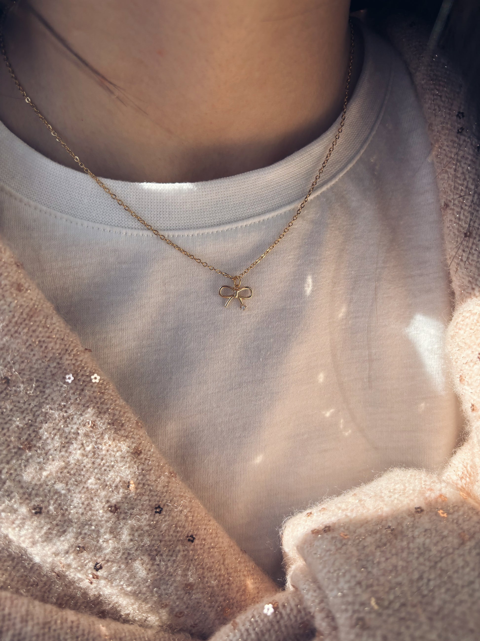 Collana in acciaio con fiocco - Dettagli di Moda