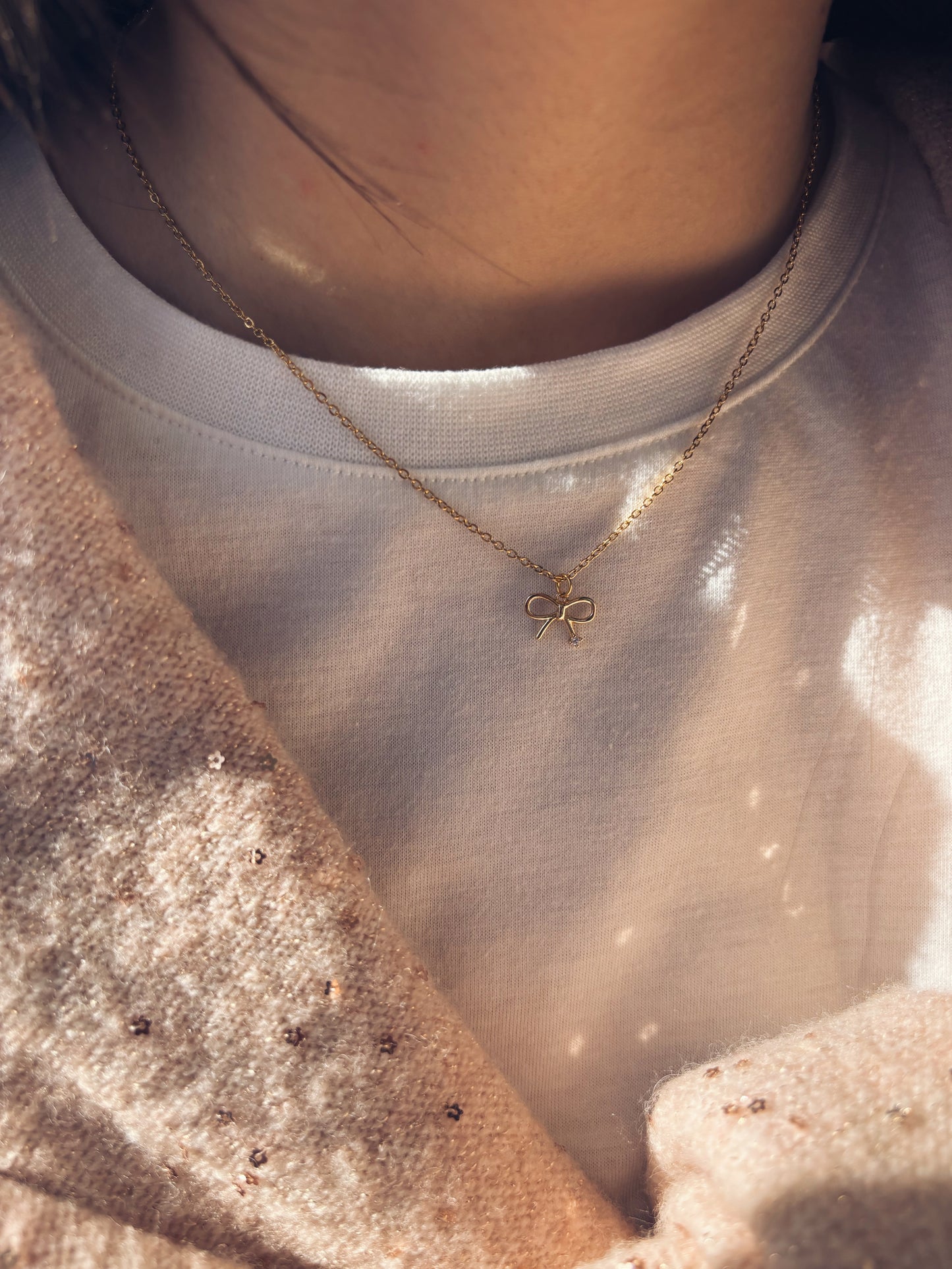 Collana in acciaio con fiocco - Dettagli di Moda
