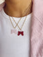 Collana con catena in acciaio e fiocco in vetro