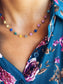 Collana in acciaio con stelline in resina colorata